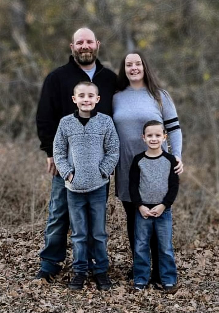 Steven Yones and his wife and two kids.